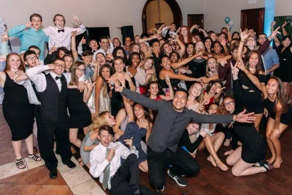 Sweet 16 party guests celebrating on the dance floor in Palm Beach County