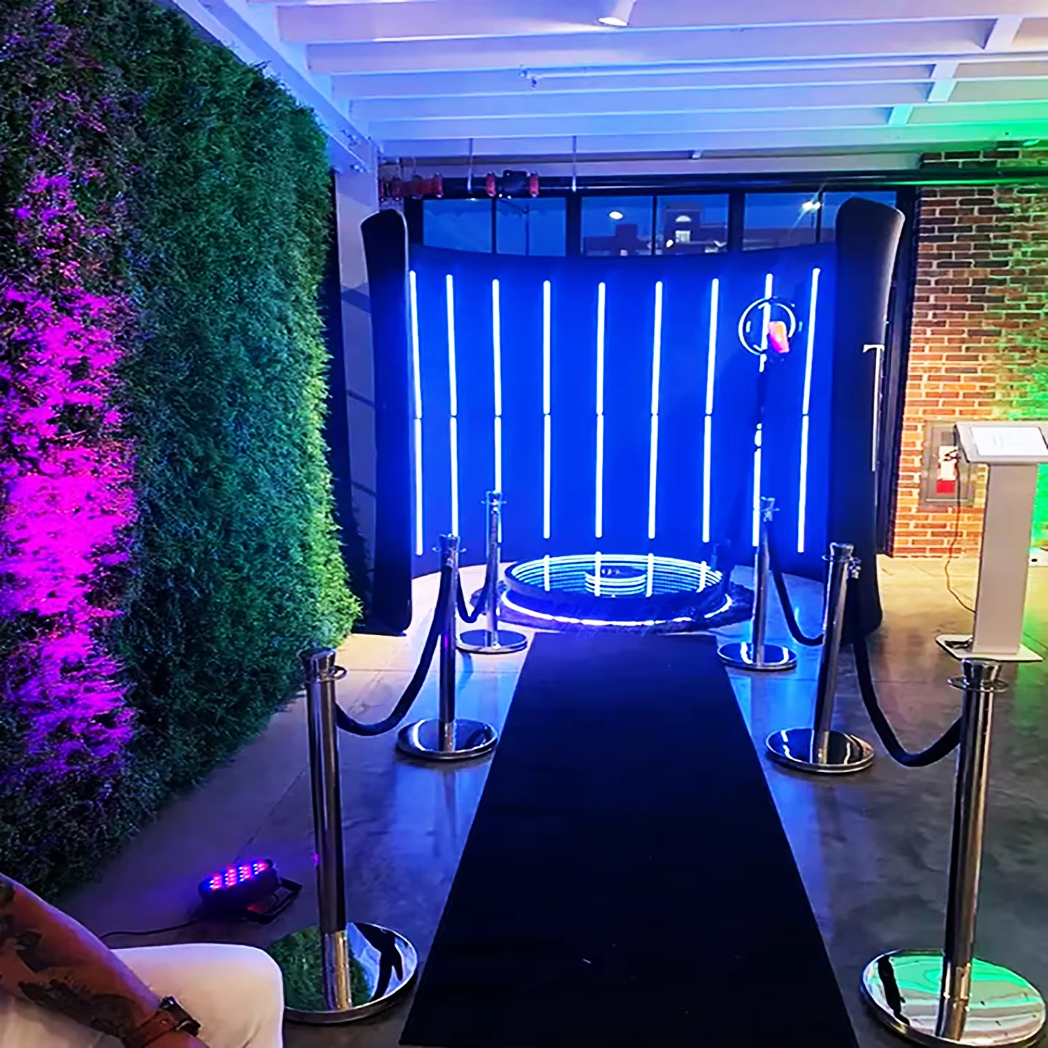 Custom LED neon sign, guest book station, and cold sparklers at a Palm Beach wedding reception photo booth