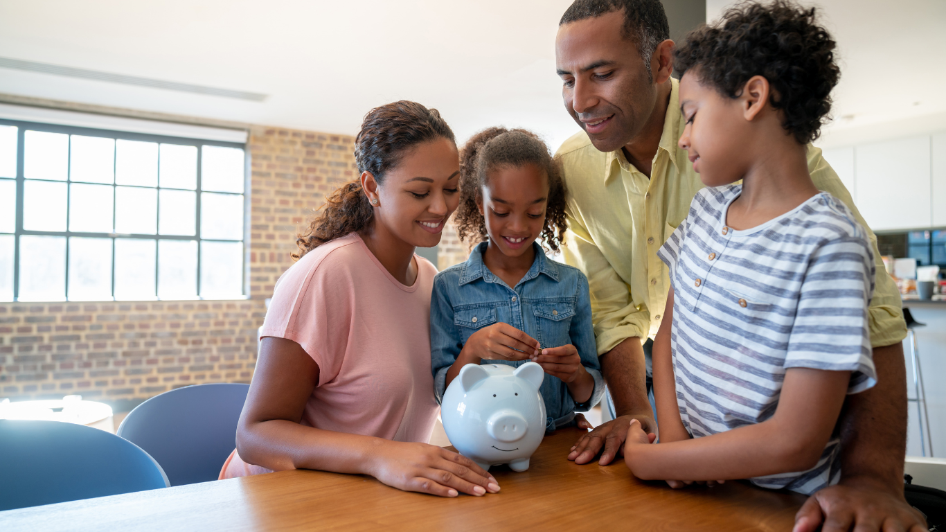 Family with piggy bank