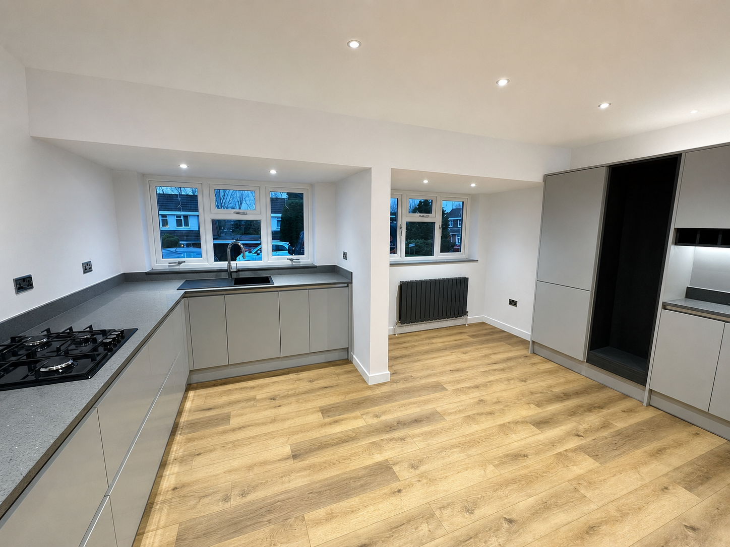 Completed garage conversion kitchen by Milano Home Improvement Ltd