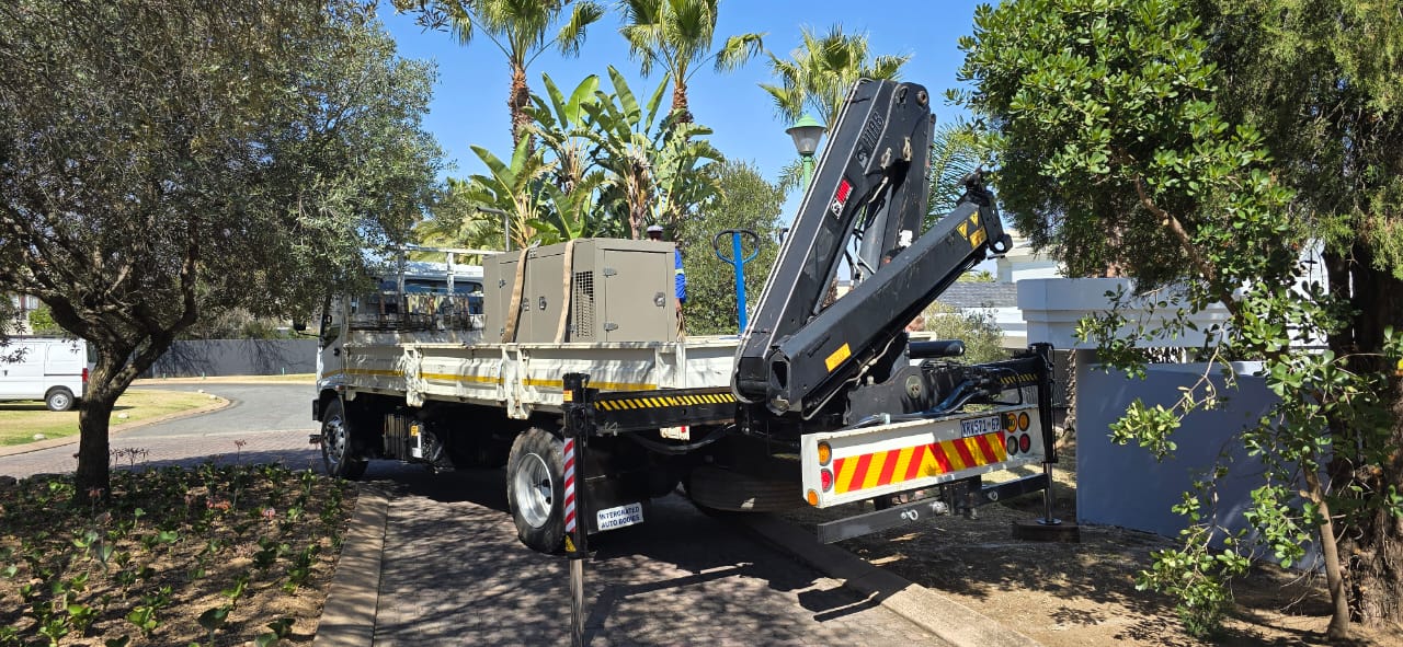 Crane truck with generator