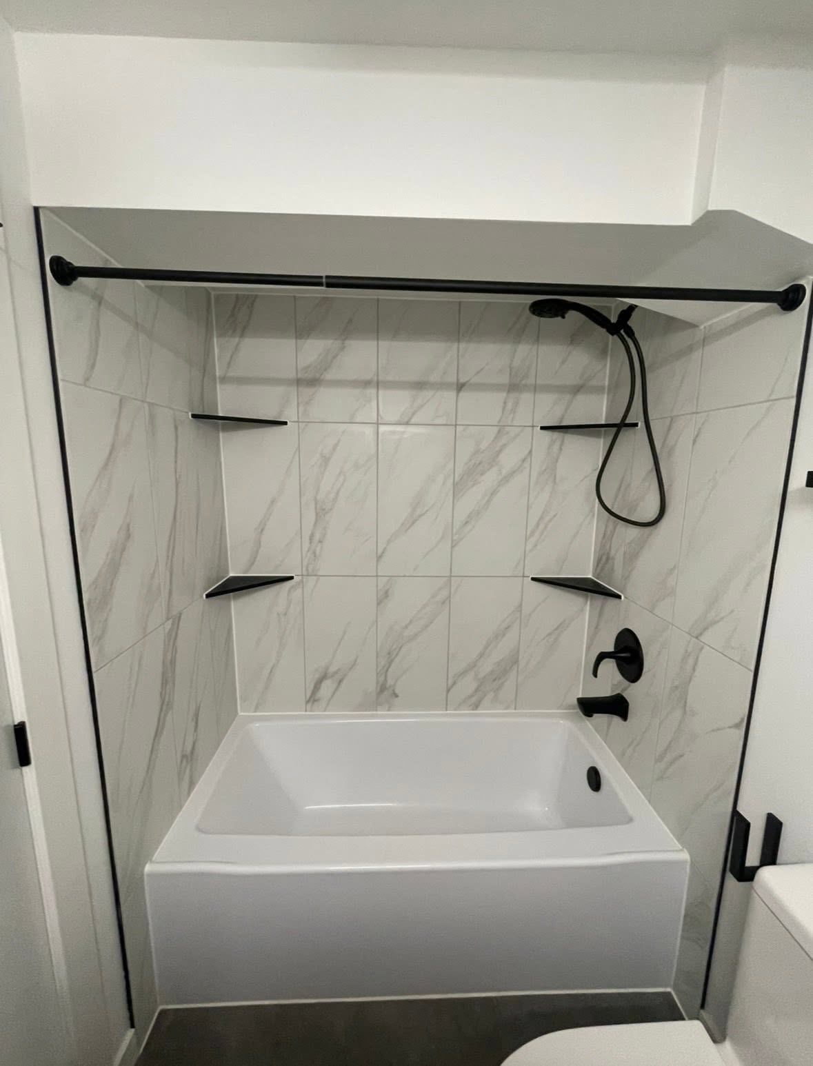 Cabinet hardware updates — CMB Handyman Services handyman project in Saskatoon