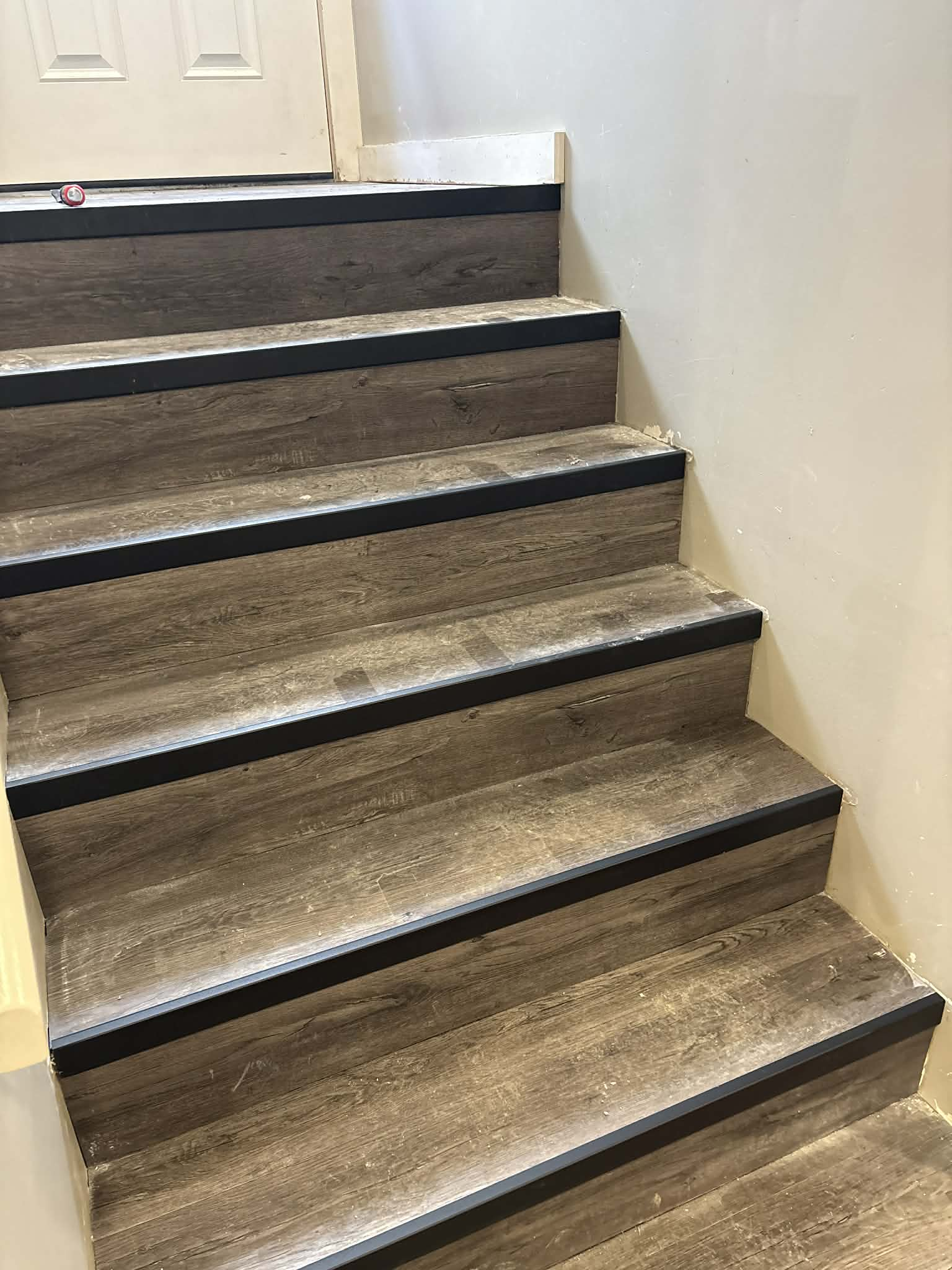 LVP and laminate installation — CMB Handyman Services handyman project in Saskatoon