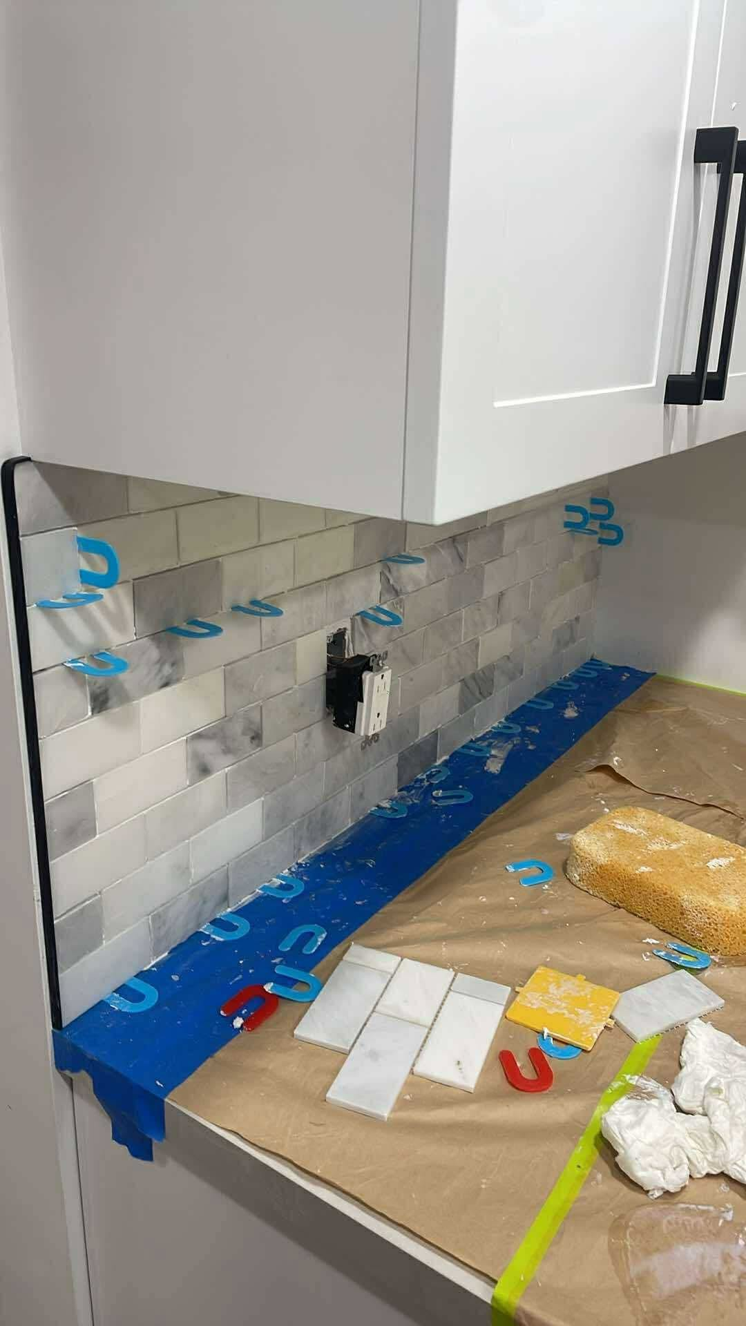Cabinet hardware updates — CMB Handyman Services handyman project in Saskatoon