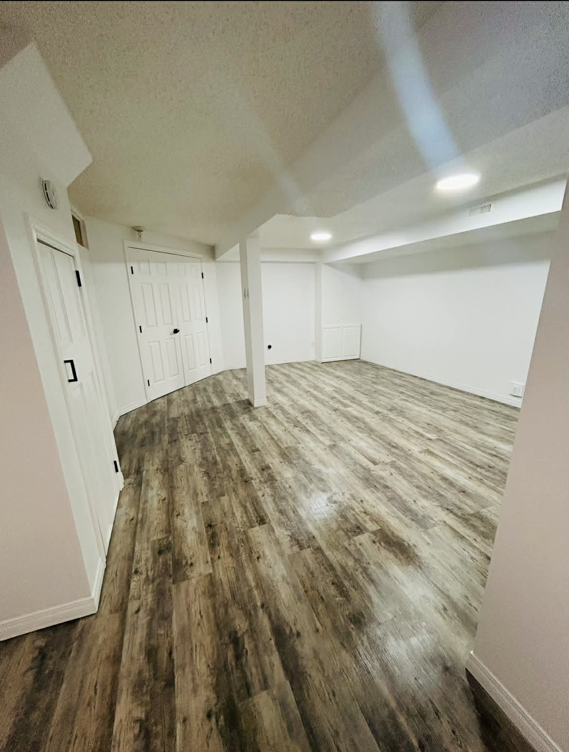 LVP and laminate installation — CMB Handyman Services handyman project in Saskatoon