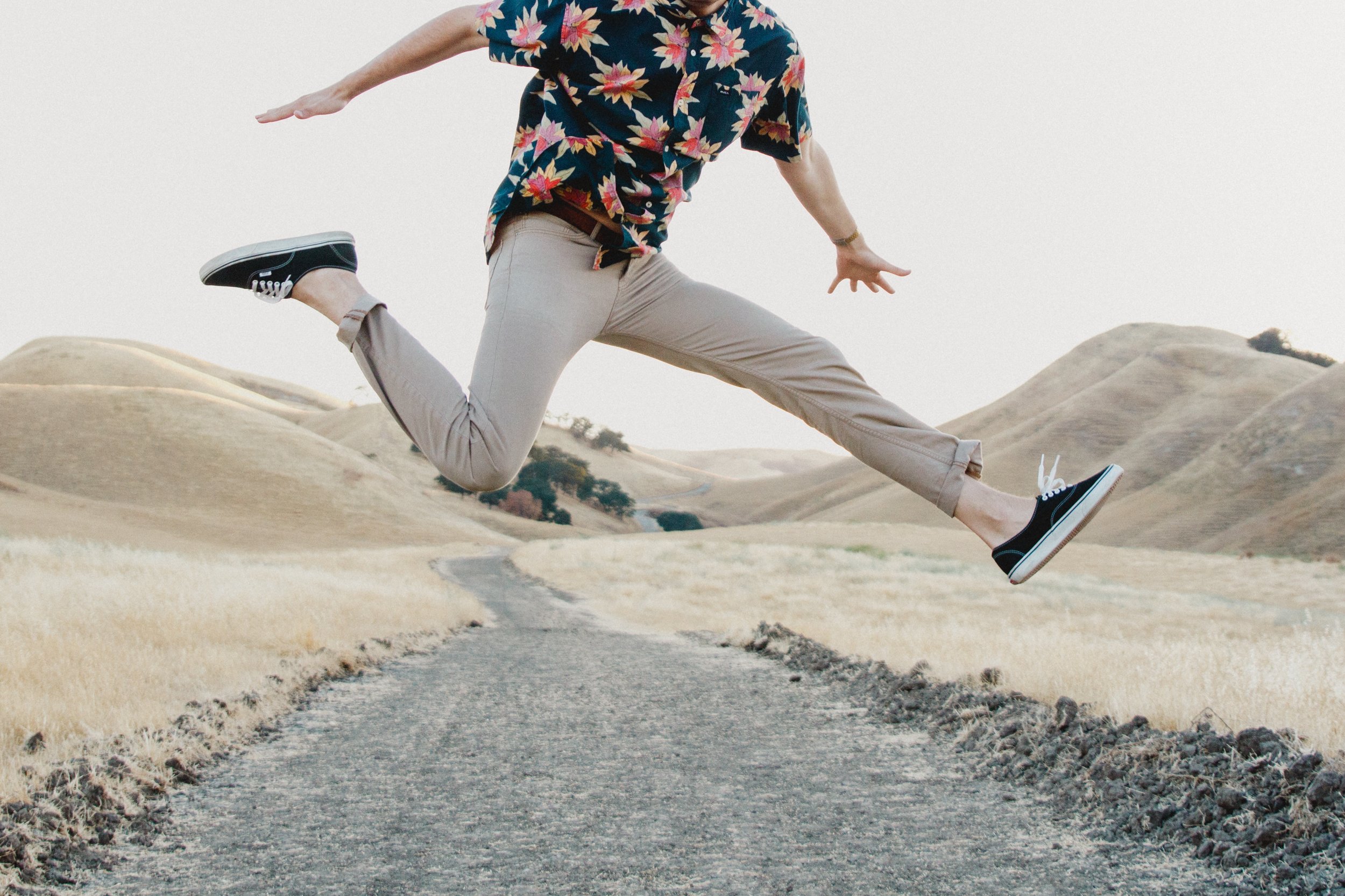 Person jumping on path