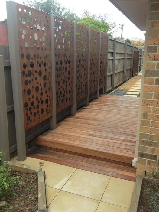 Custom timber decking and decorative screen built by RGH Home Improvements