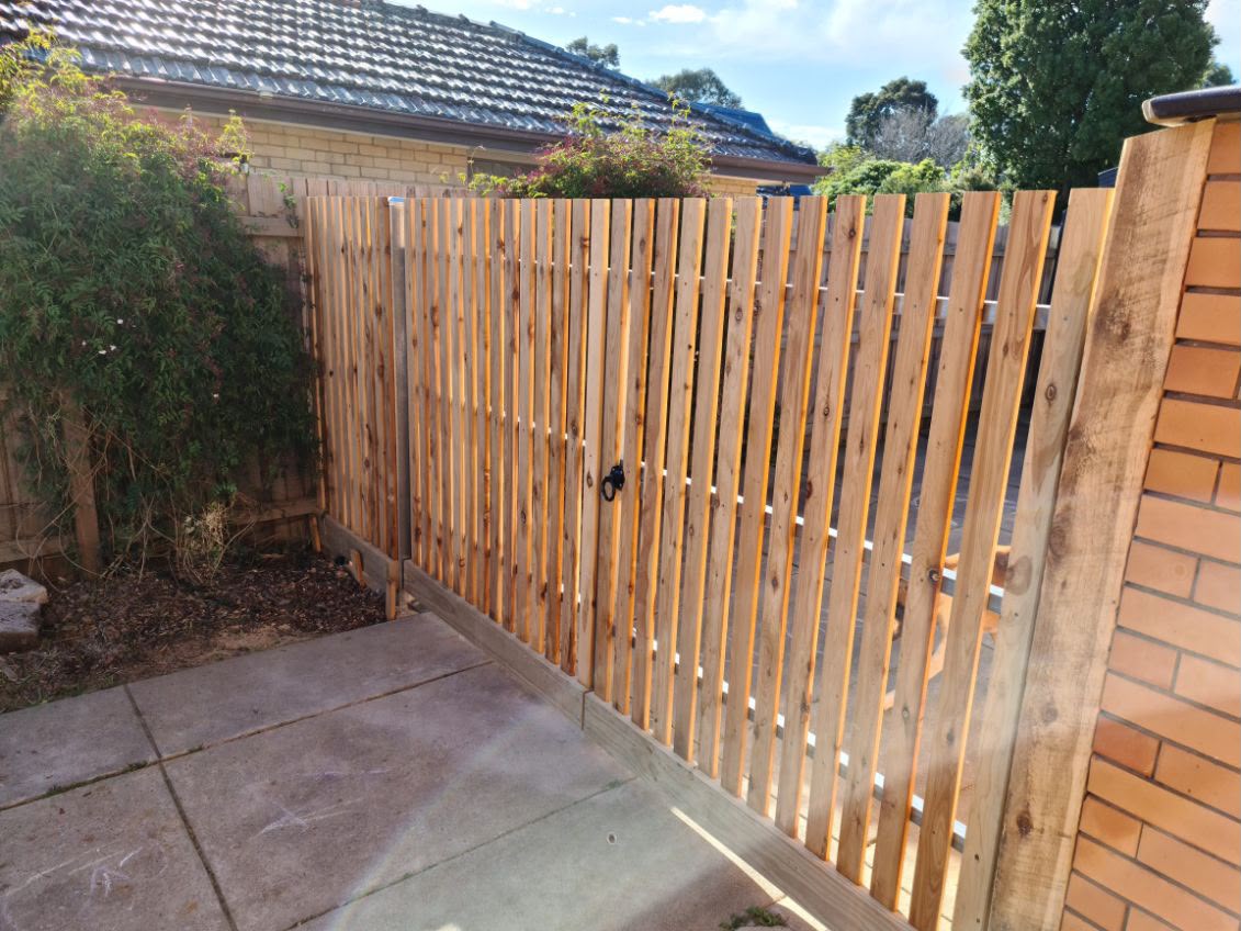 Timber slat gate and fencing installation by RGH Home Improvements
