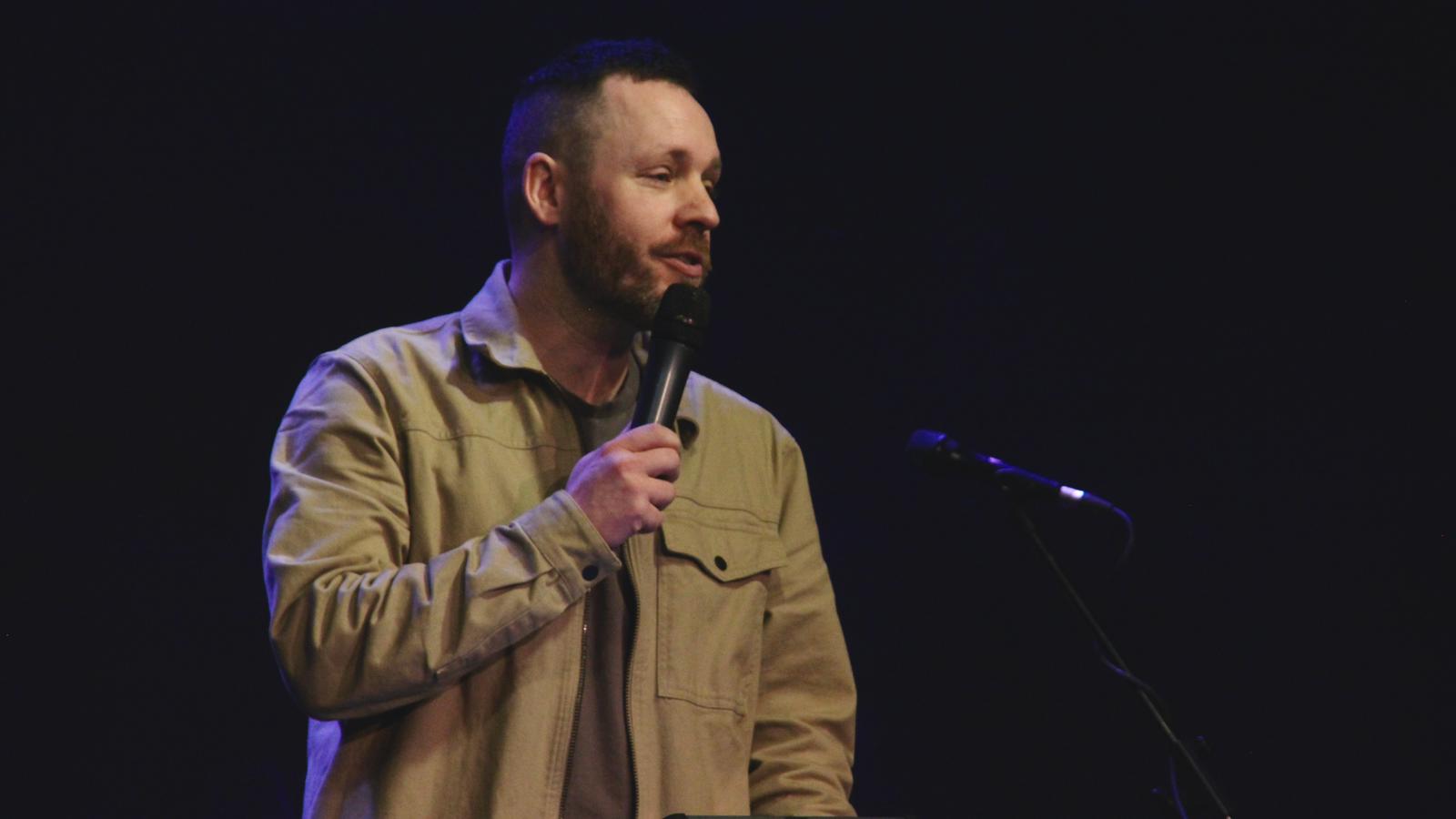 Pastor Dave Brackenridge speaking at a Christian conference