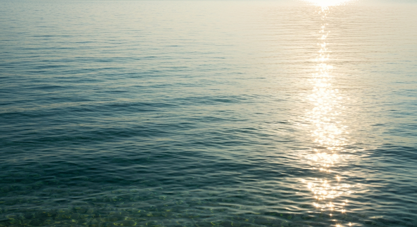 A gentle sunlit water surface