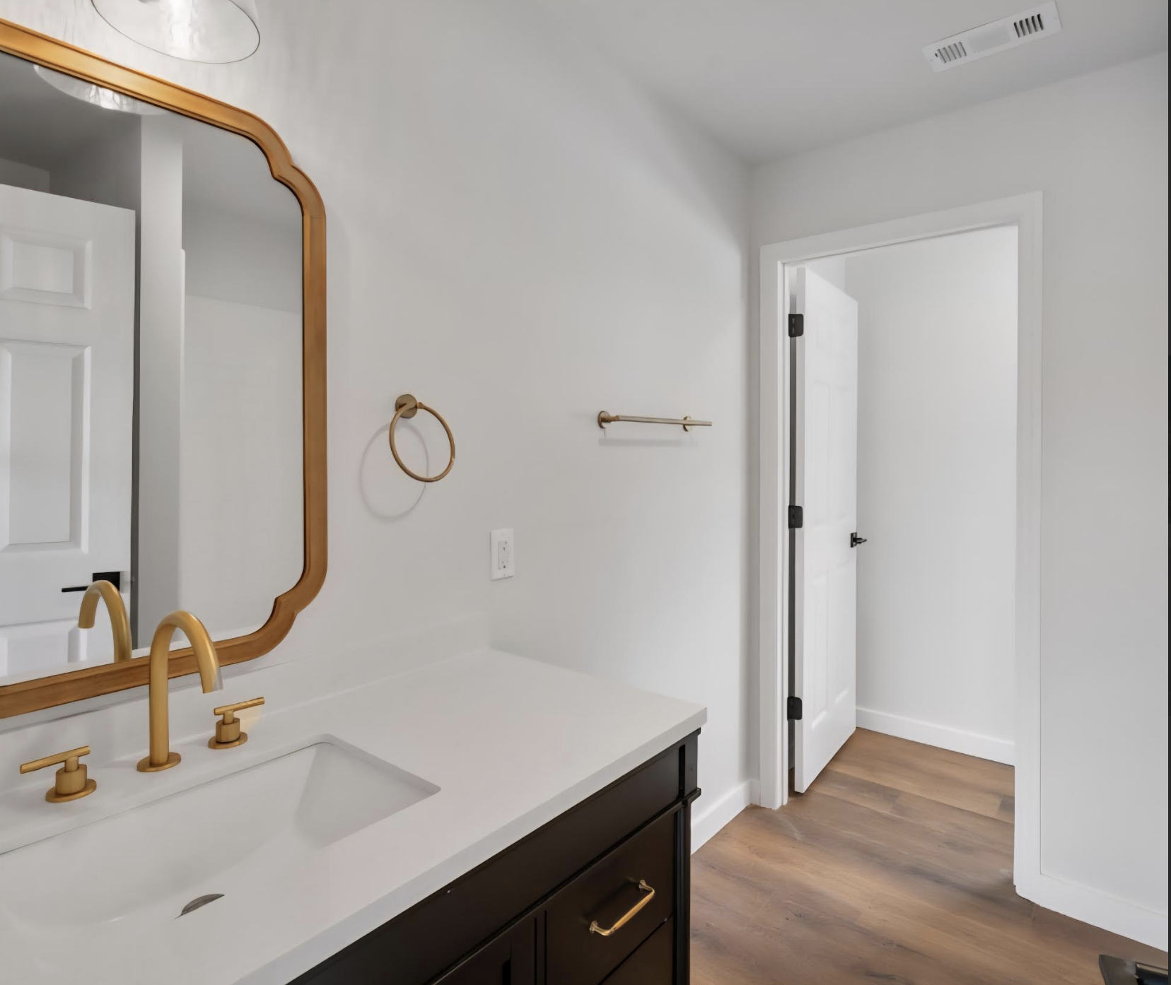 Modern Bathroom & Gold Hardware project completed in Columbia, TN by C & X Construction