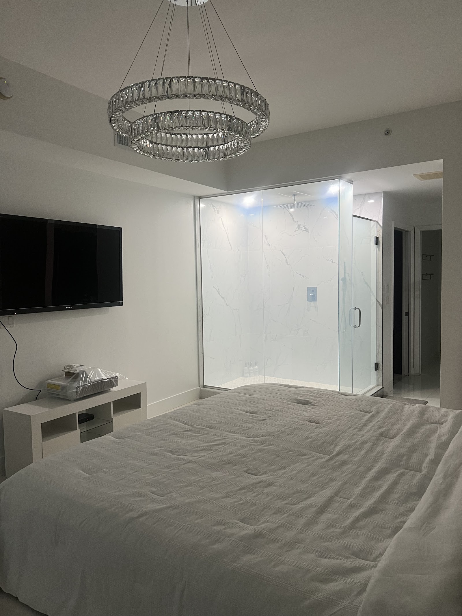 Condo bedroom glass partition with smart film switched to frosted
