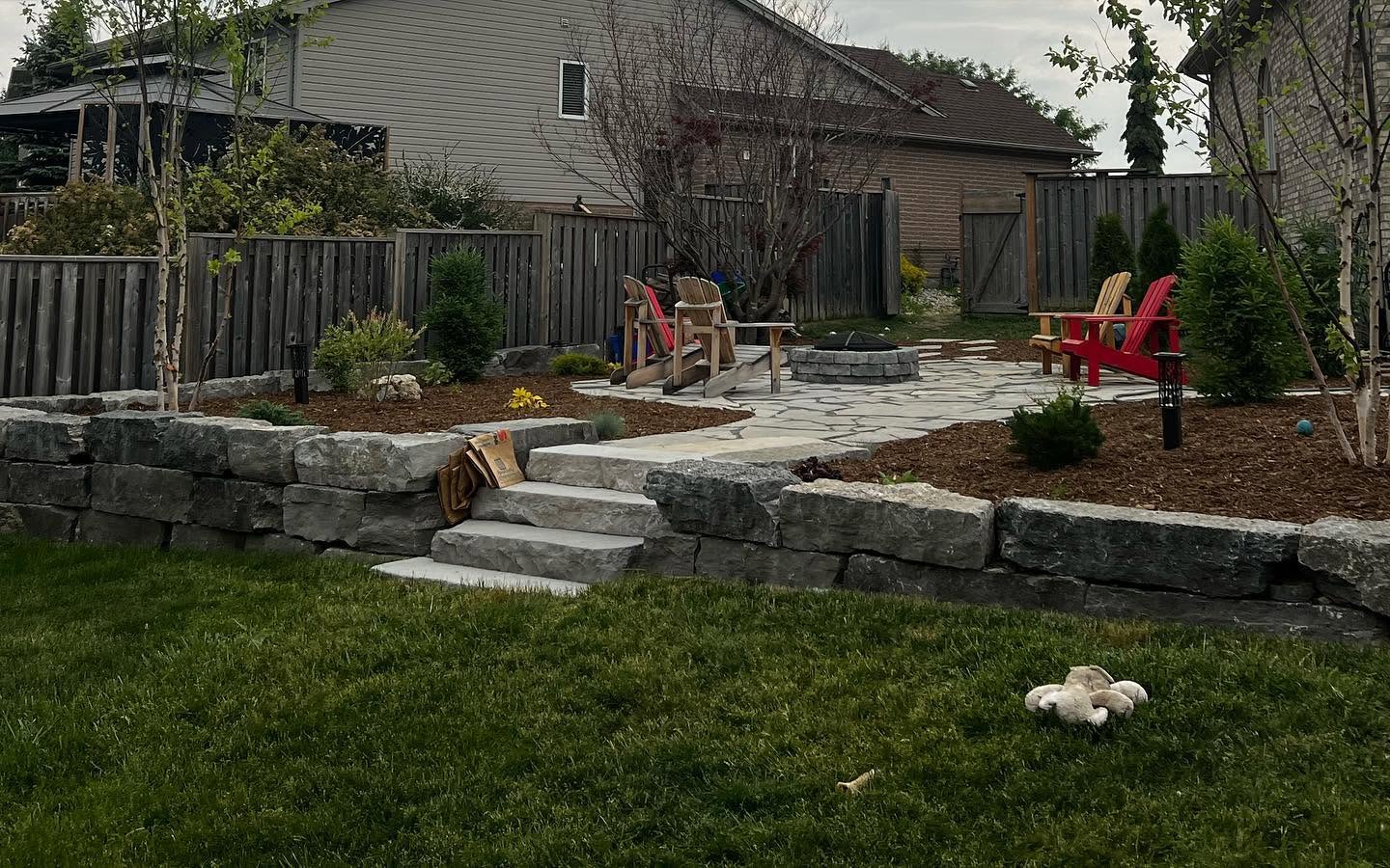 Stone retaining wall and steps construction - Hardscaping services