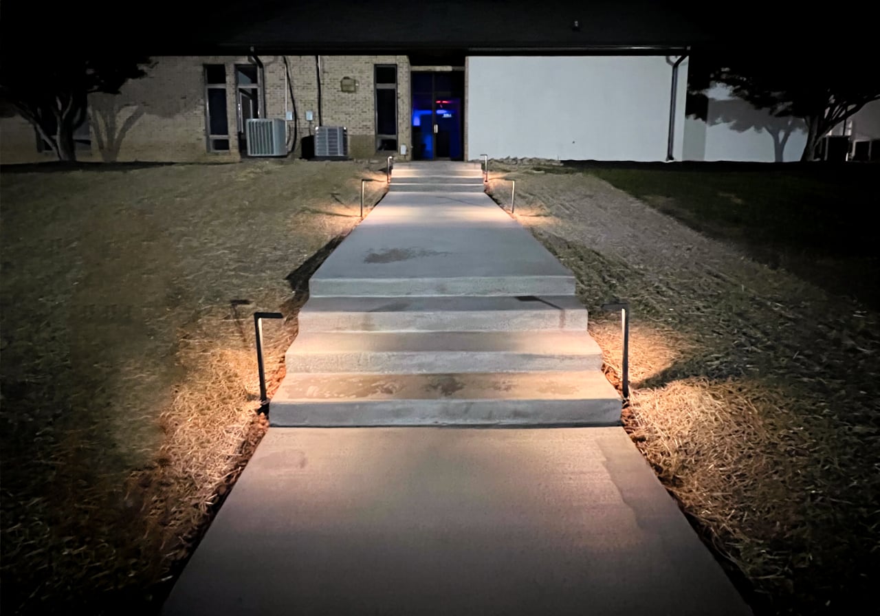 Illuminated concrete steps and walkway project by Southern Touch Landscaping