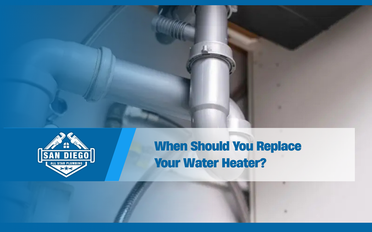 Plumber inspecting an aging residential water heater