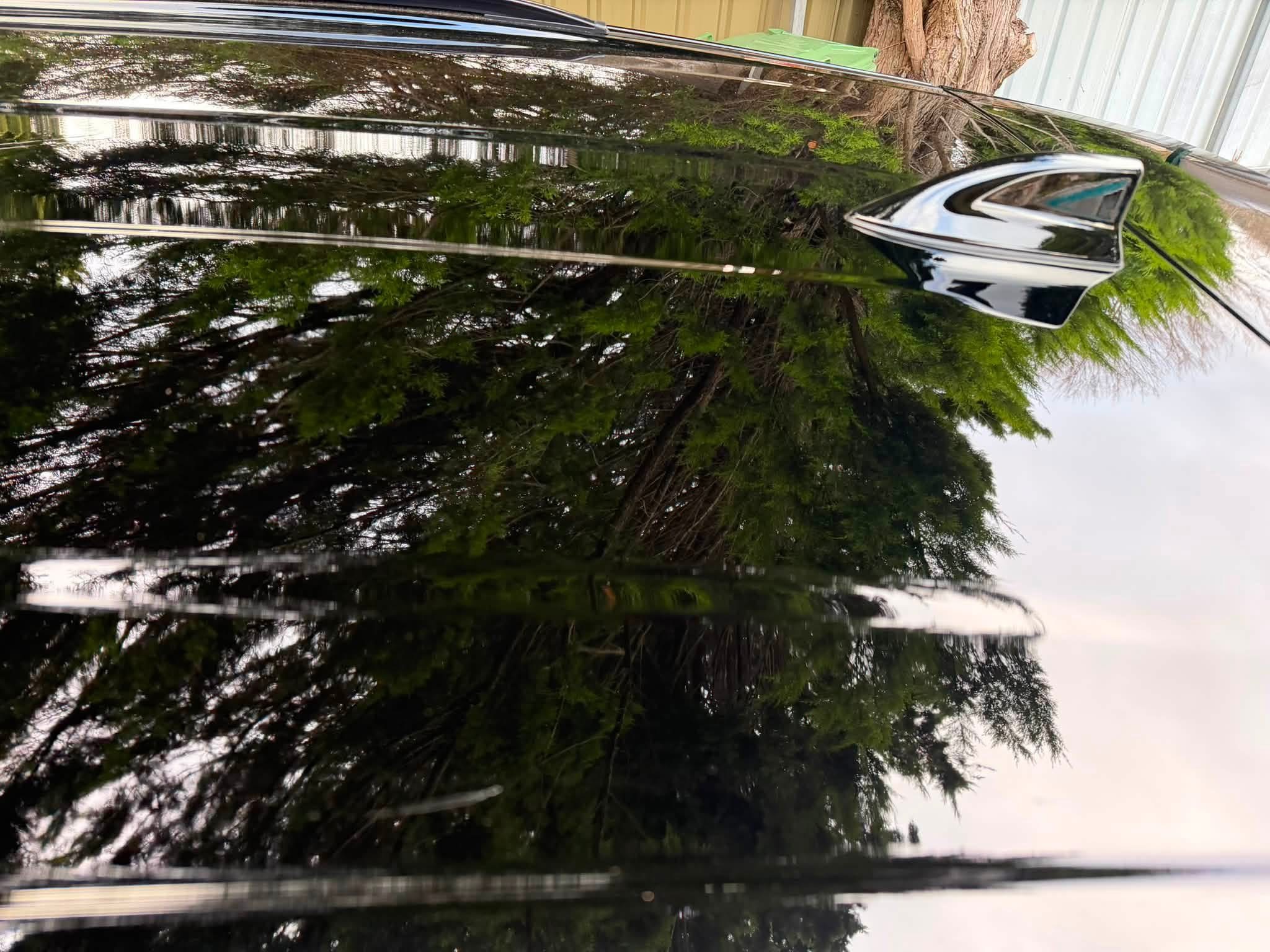 After Black car roof reflection