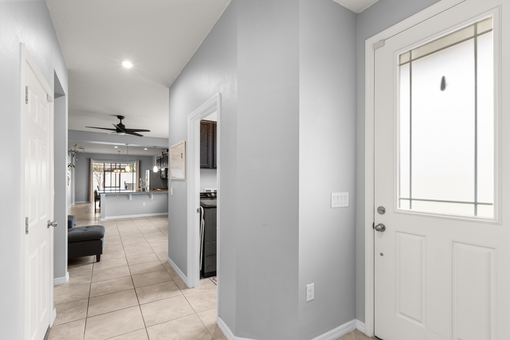 2401 Avian Loop Kissimmee FL - Welcoming entry foyer with natural light and direct view toward open living areas