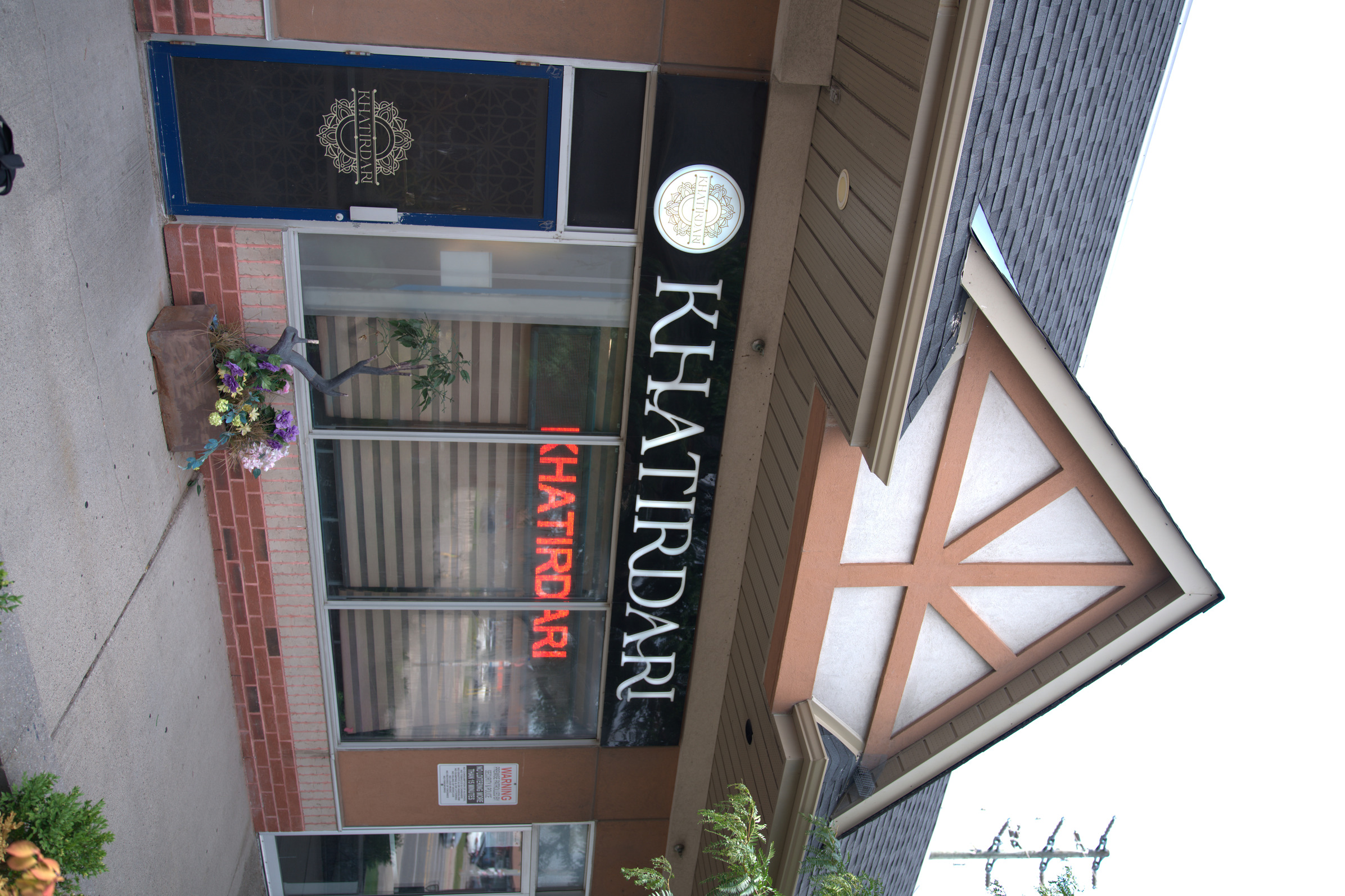 Khatirdari venue storefront exterior on Ray Lawson Blvd Brampton with illuminated signage