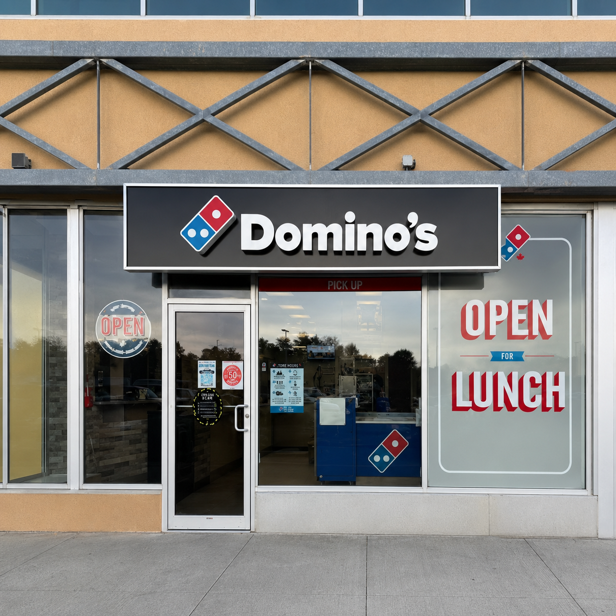 Domino's Pizza illuminated sign and window graphics