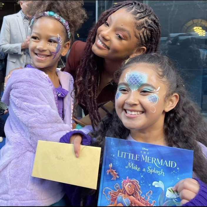 Halle Bailey at Little Mermaid premiere with kids wearing Little Feet Events face paint