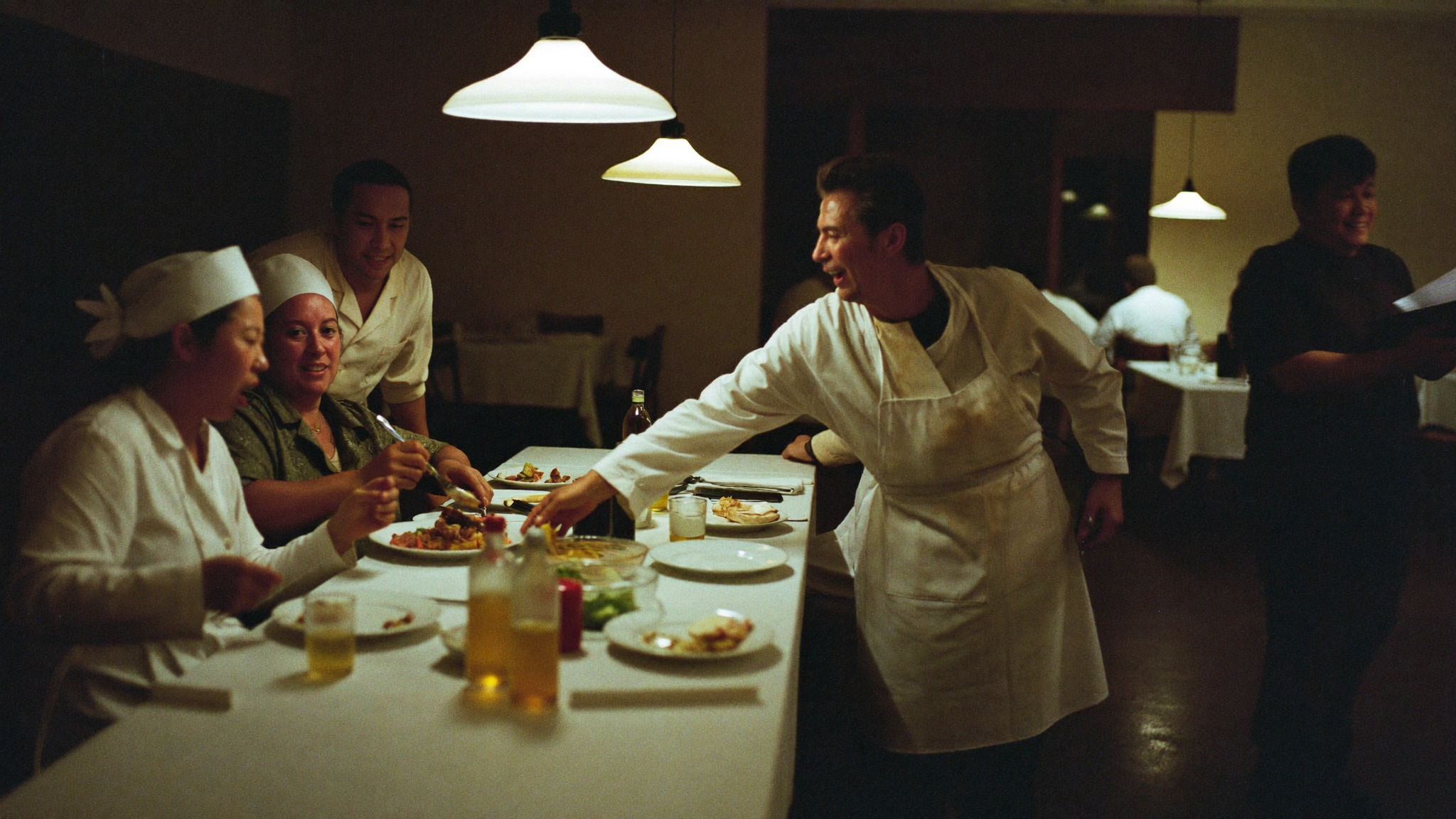 Restaurant team sharing a meal together