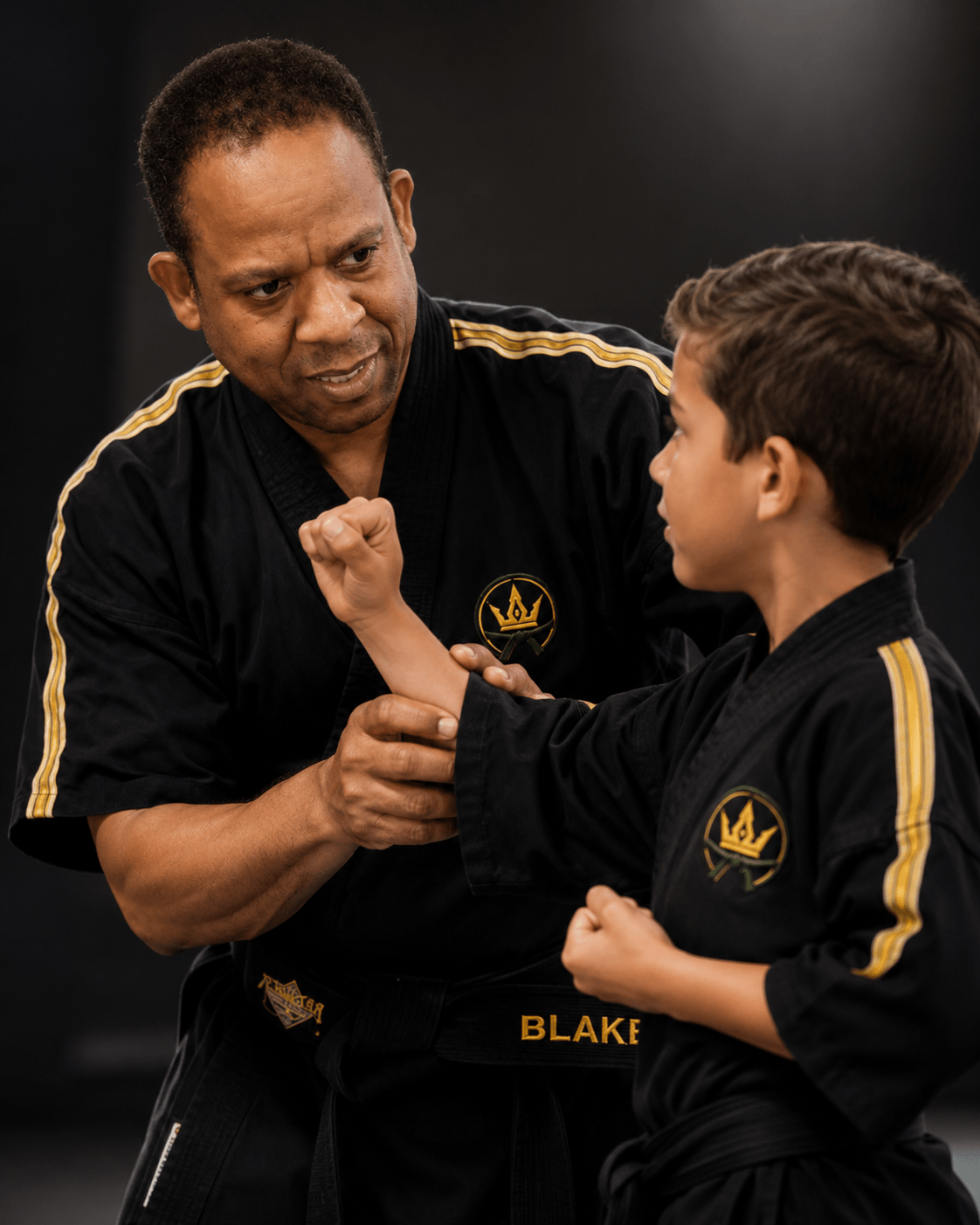 Instructor adjusting student's technique