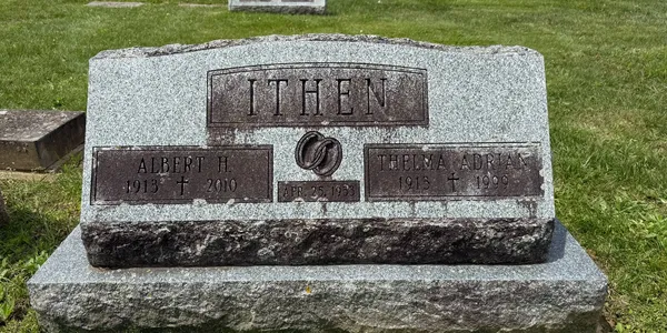Headstone before basic cleaning