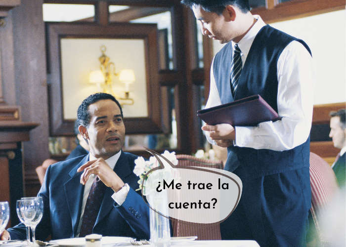¿Me trae la cuenta? — how to ask for the bill in Spanish at a restaurant in Mexico, one of 10 key Spanish restaurant phrases for dining out as an expat