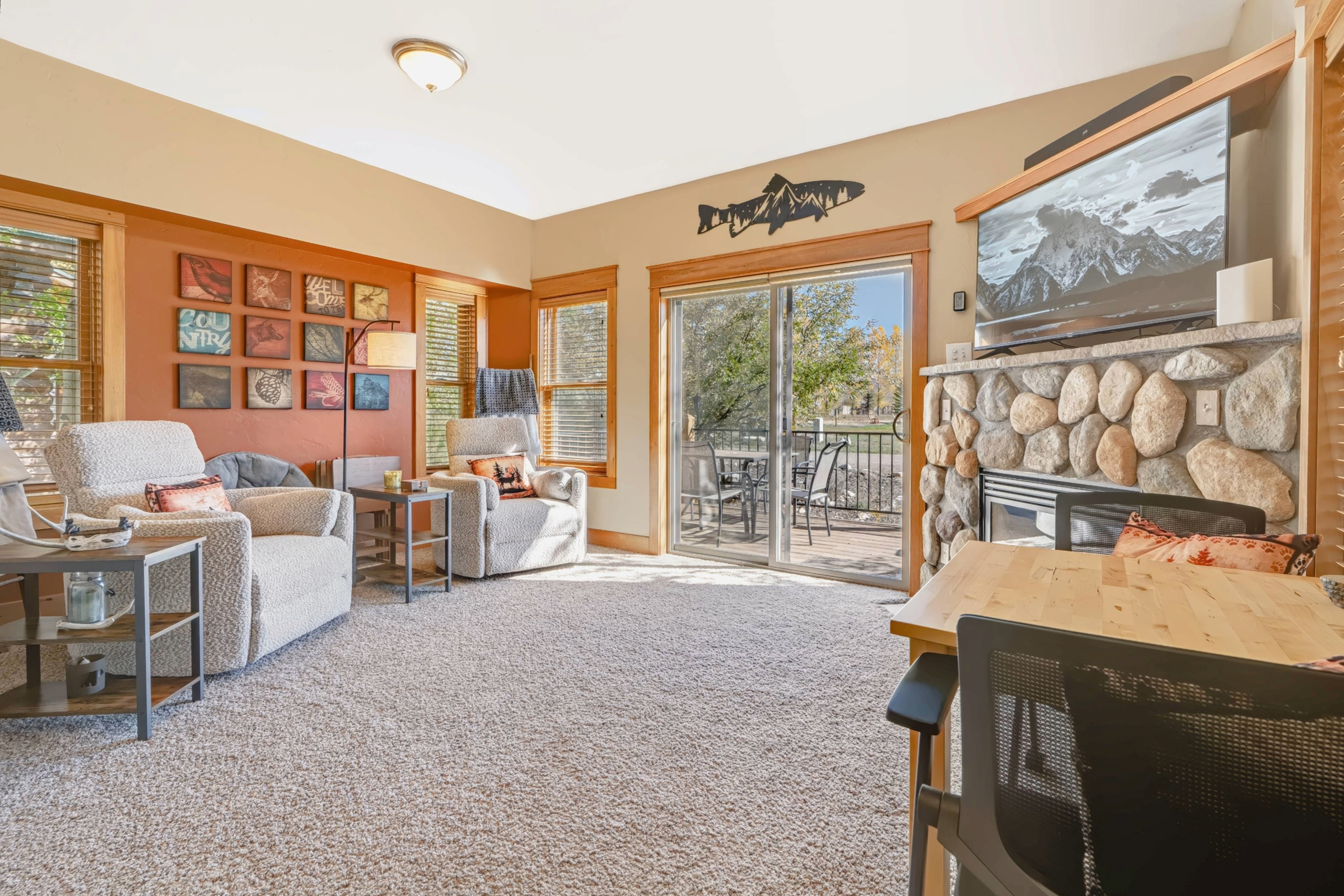 Cozy Living Room & River Rock Fireplace