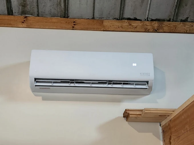 Clean indoor mini split wall unit installation in Schertz room