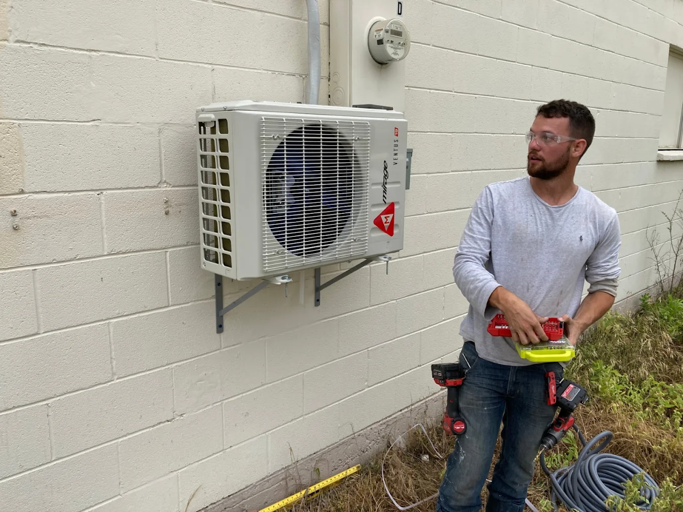 Professional white line-hide conduit covering copper refrigerant lines