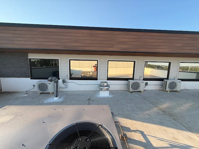 Commercial roof mounted ductless mini split heat pump condensers in McKinney, TX