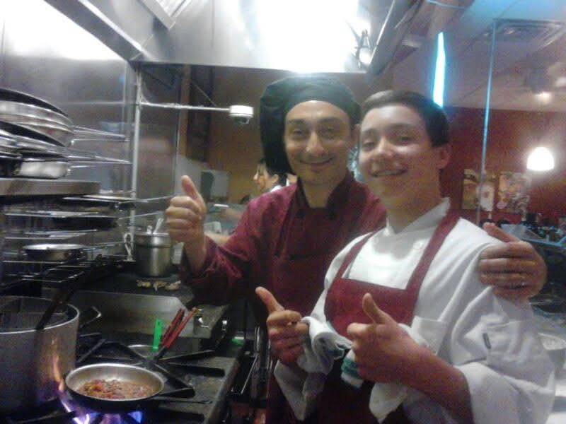 Antonio and his father at their restaurant