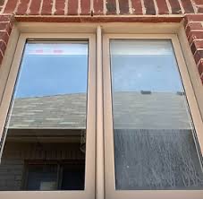 Professional window cleaning on a residential property in Essex
