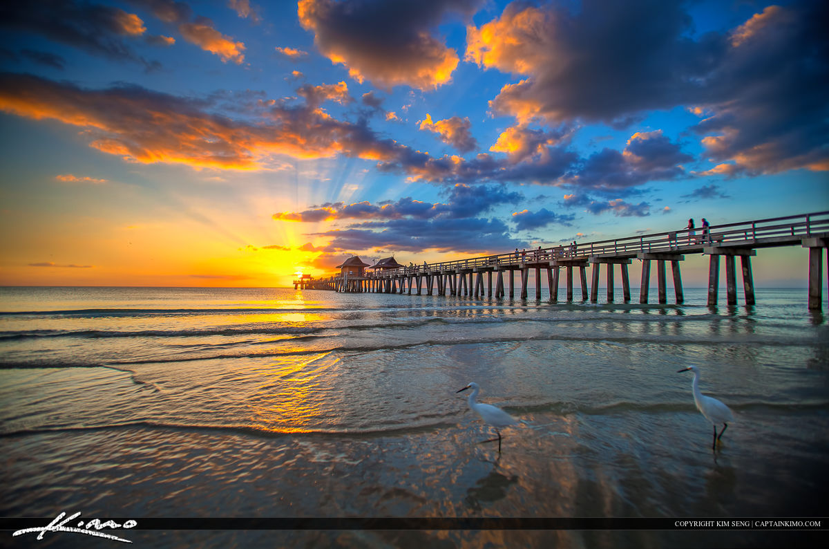 Naples Pier at sunset before Hurricane Ian, extending into the Gulf of Mexico