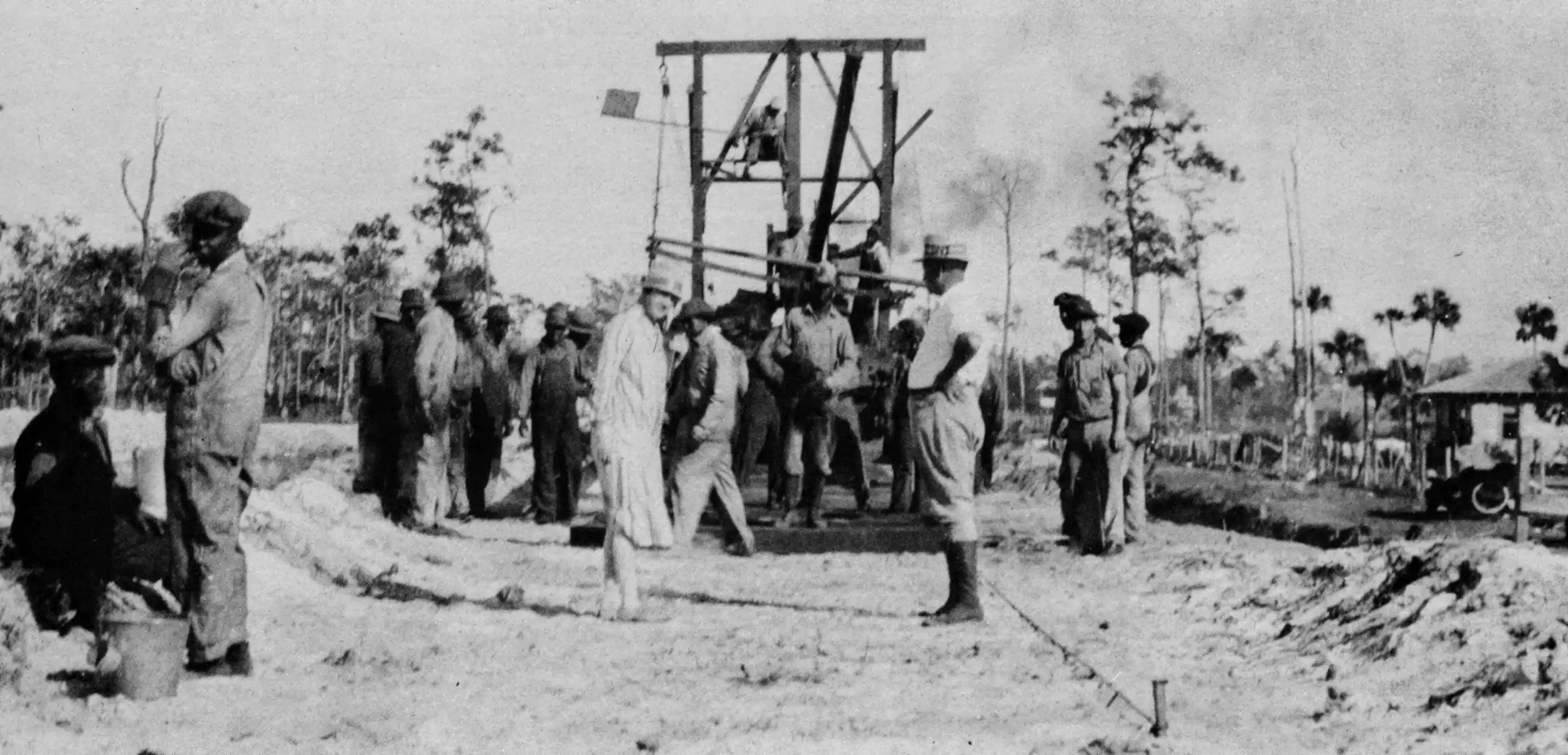 Workers laying railroad track in Naples, Florida in 1926