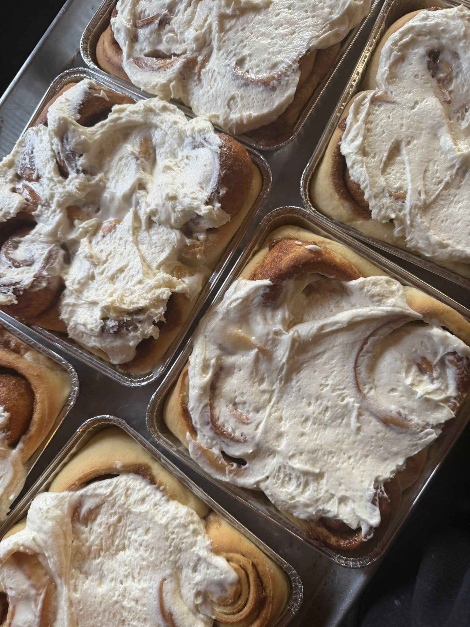 Fresh cinnamon rolls with cream cheese frosting