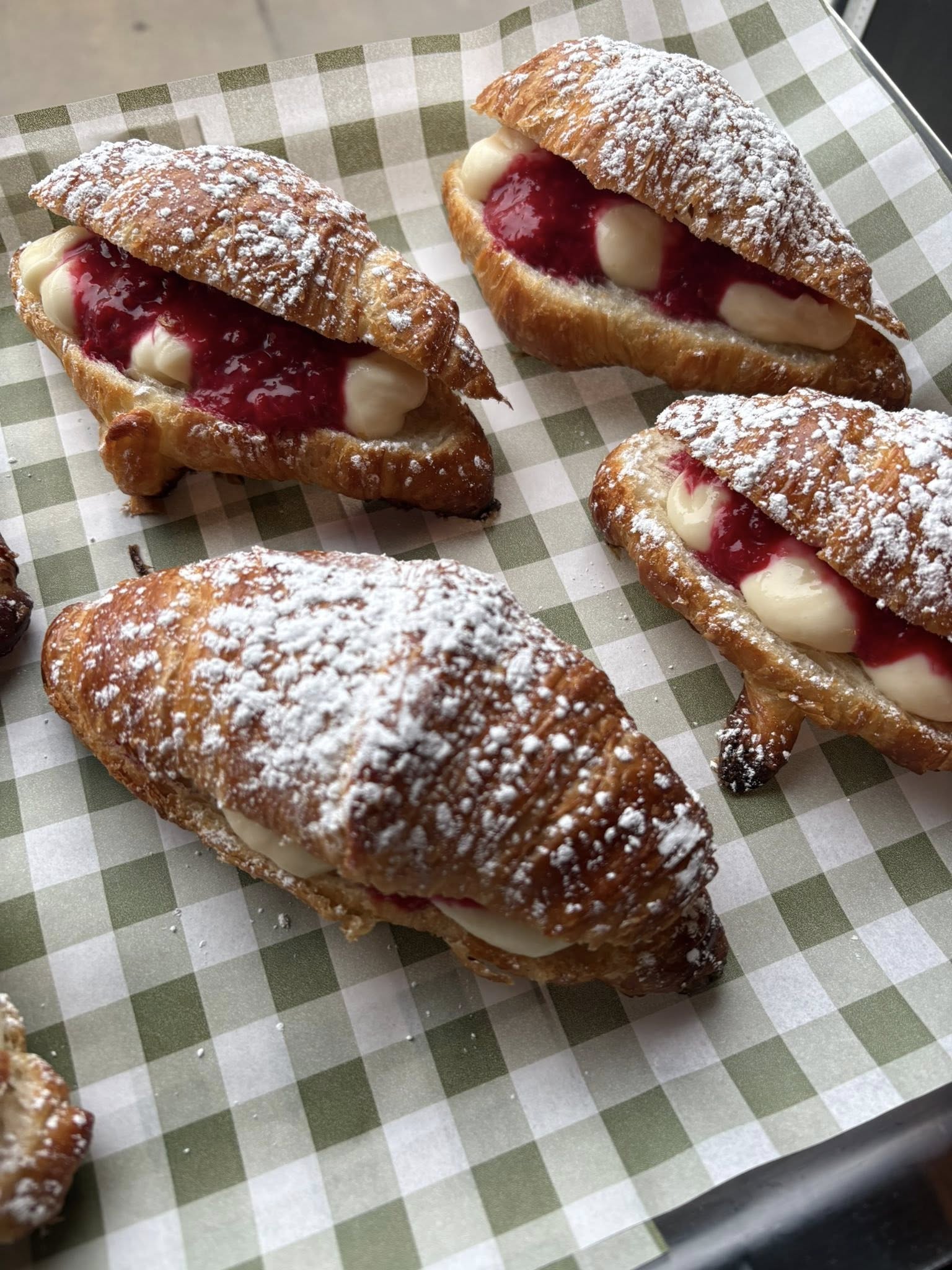 Freshly baked cream-filled croissants