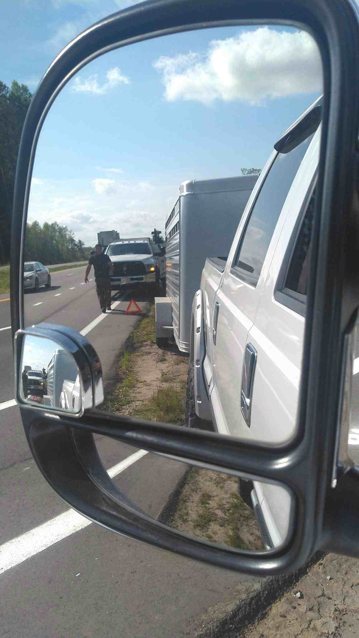 Roadside assistance for vehicle with trailer on the highway