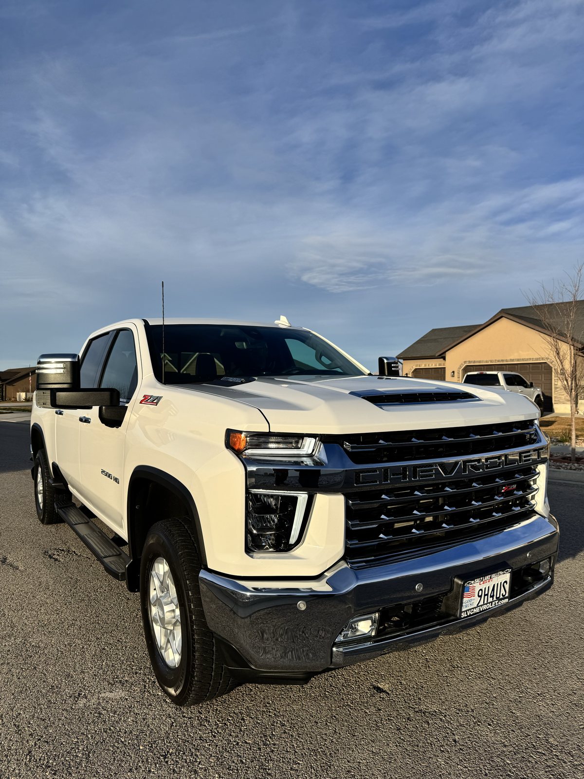 White Chevrolet Silverado 2500 detailed on site by Nomada mobile detailing in Northern Utah.