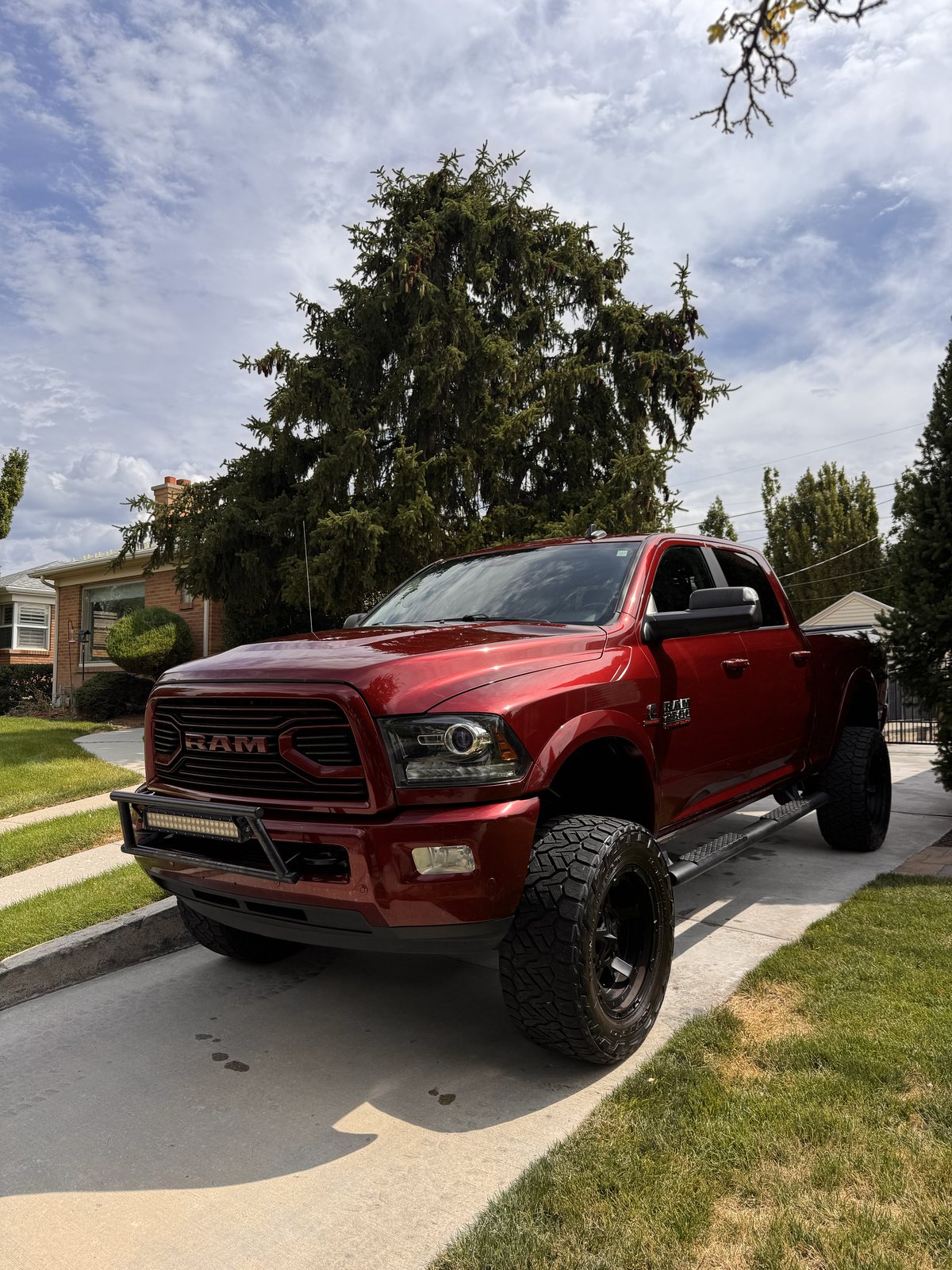 Red lifted Ram 2500 detailed on site by Nomada mobile detailing in Northern Utah.