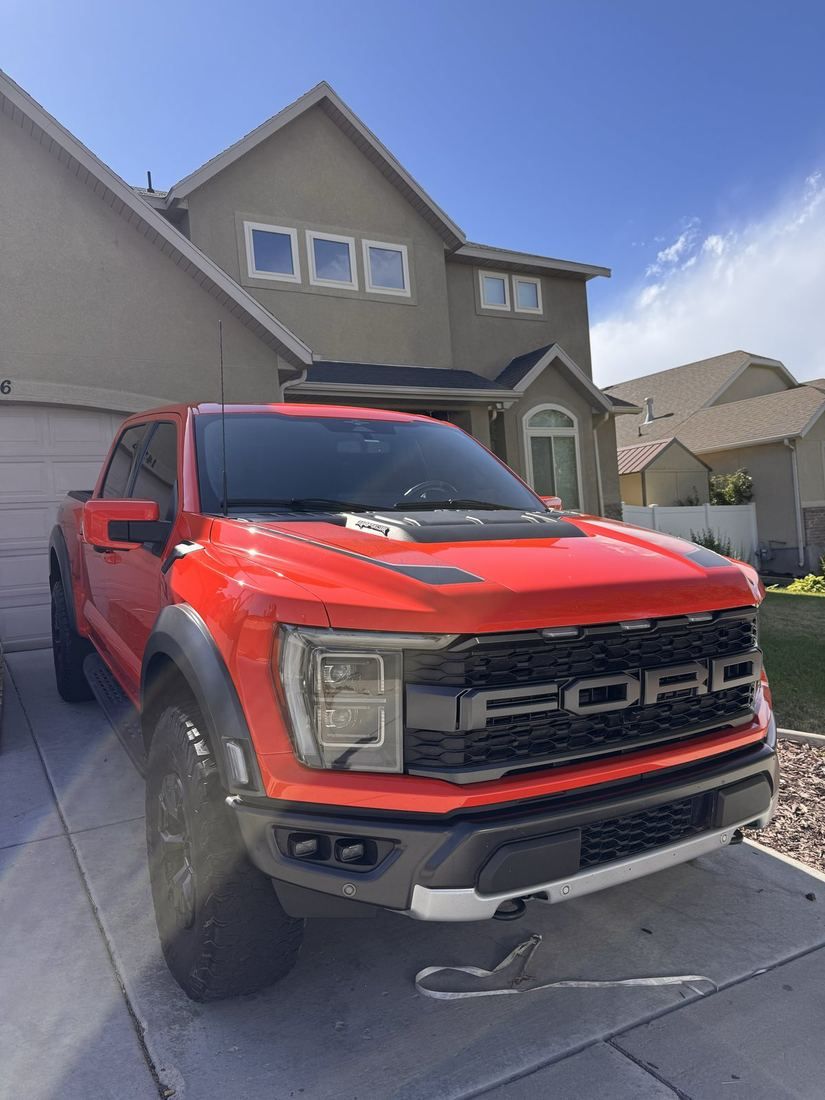 Red Ford Raptor ceramic coated by Nomada at a customer's home