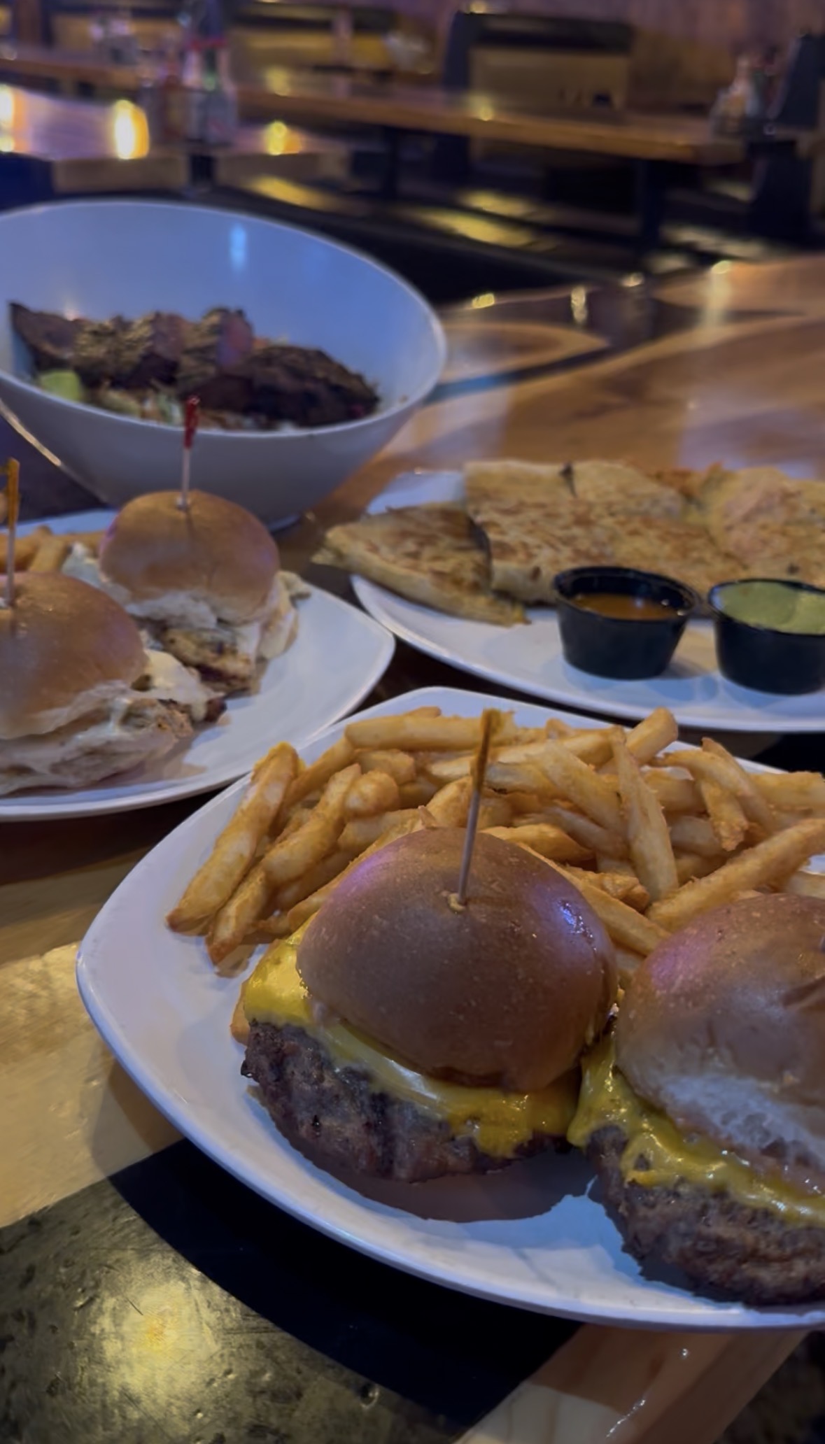 Gourmet burgers and crispy french fries served at My Place Sports Bar and Grill in Huntington Beach