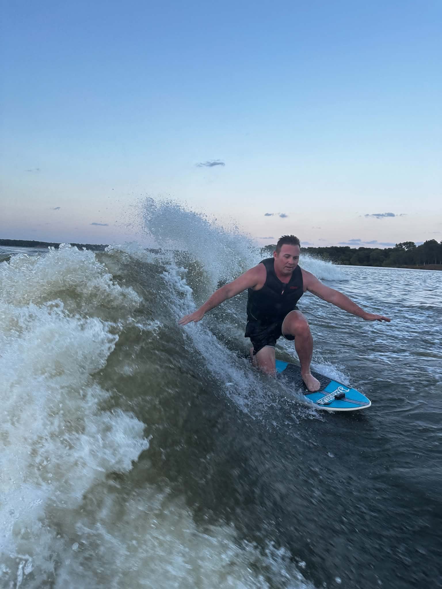Wake surfing on Lake Lewisville with the surf club