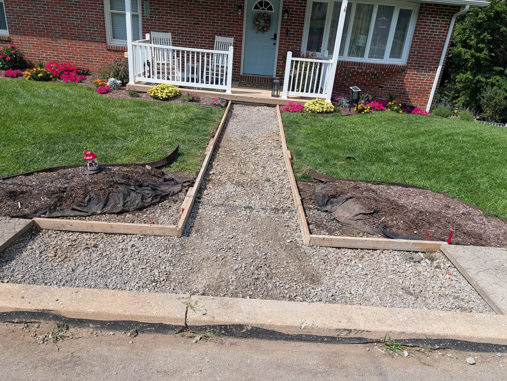 Walkway excavation and wooden framing prep work