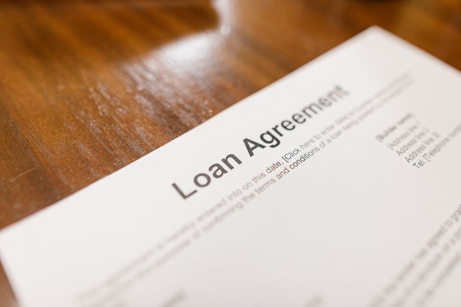 Installment agreement documents and payment plan paperwork on a desk