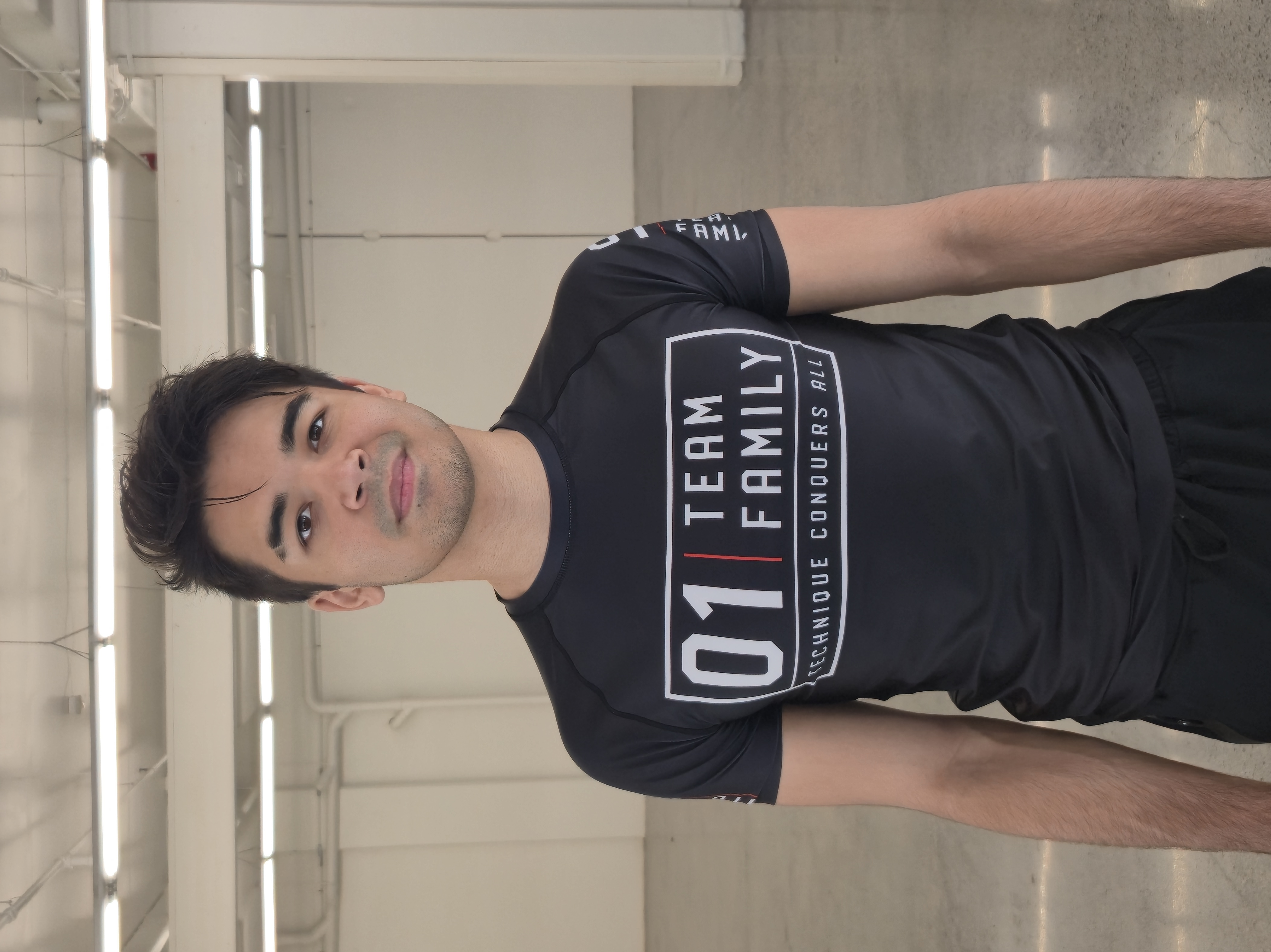 Ender Cleofe in striking and grappling rashguard at Caio Terra Academy Kirkland