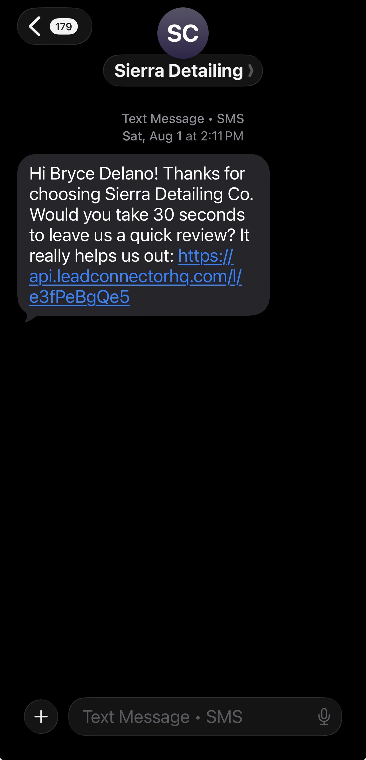 Automated SMS review request sent to customer from Sierra Detailing
