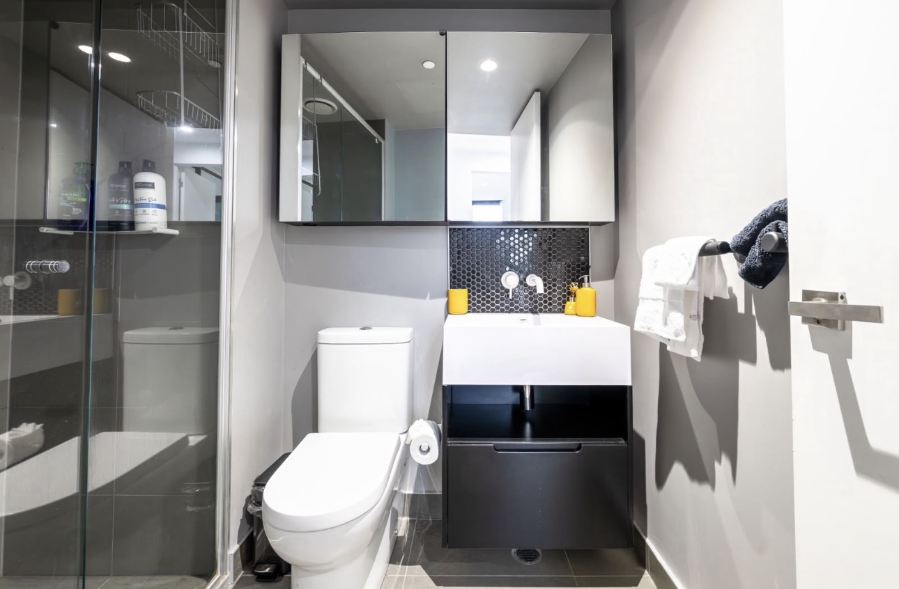 Modern bathroom with black vanity