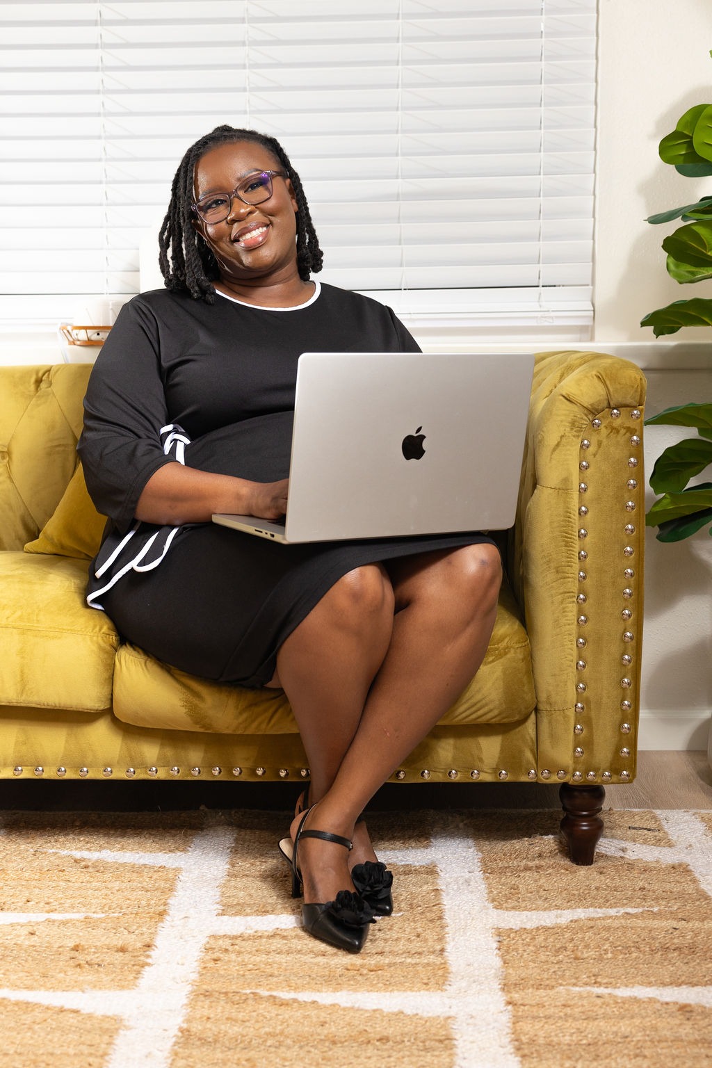 Stephanie Leandre in a warm, welcoming client consultation setting